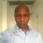 A portrait photo of Segun Olusanya
